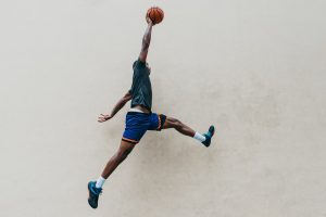 Basketball player dunking