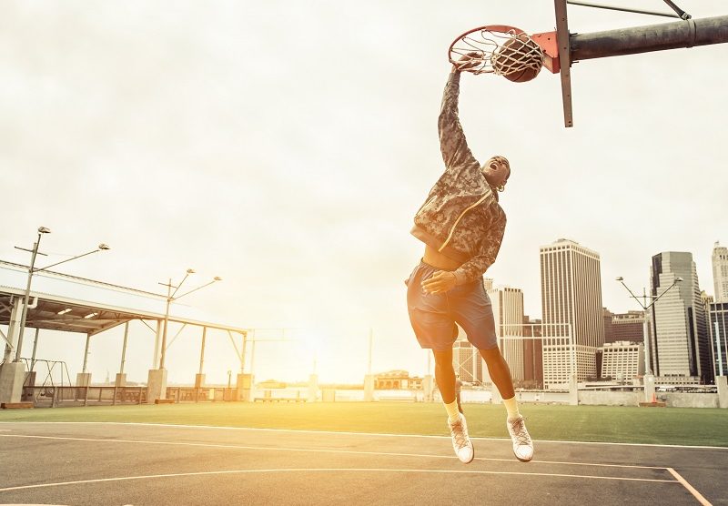 basketball player dunking